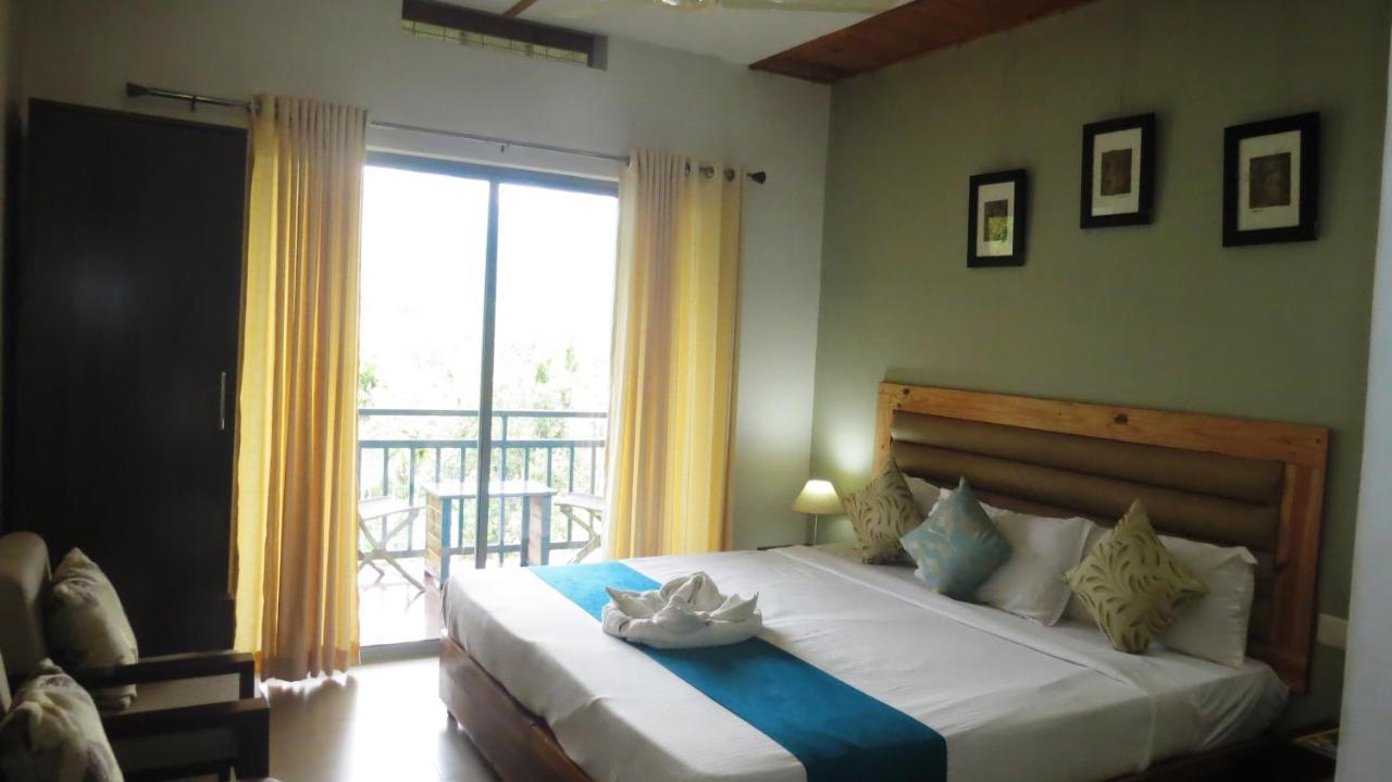 Mistletoe Homestay & Cafe มุนนาร์ ภายนอก รูปภาพ